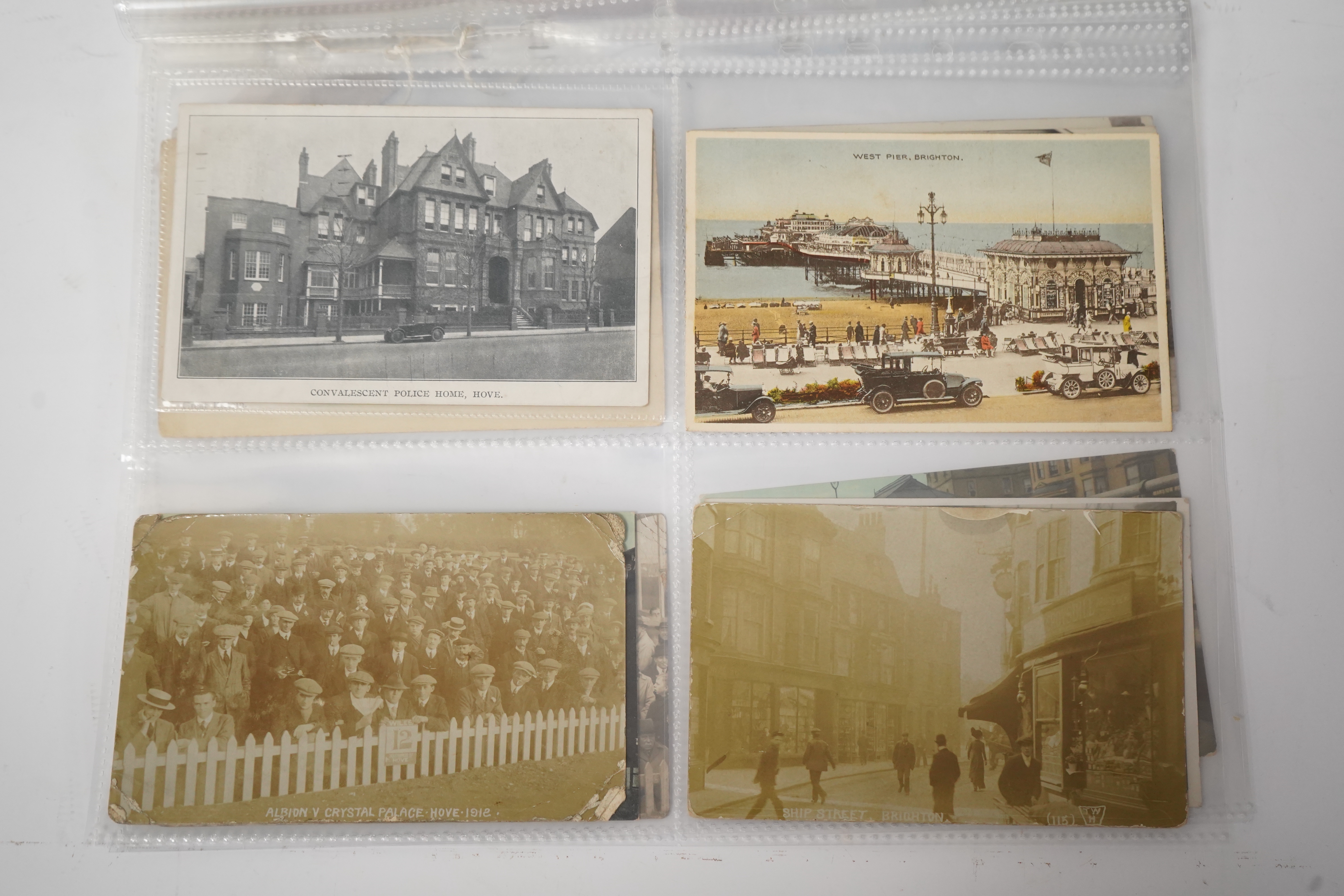 Brighton & Hove interest; a collection of one hundred and twelve assorted vintage postcards, mostly pre WW1, including novelty, shopfronts and Albion football matches